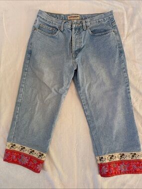 LONDONJEAN Capri Light Blue Jeans with Red Embroidered Cuffs. Button fly